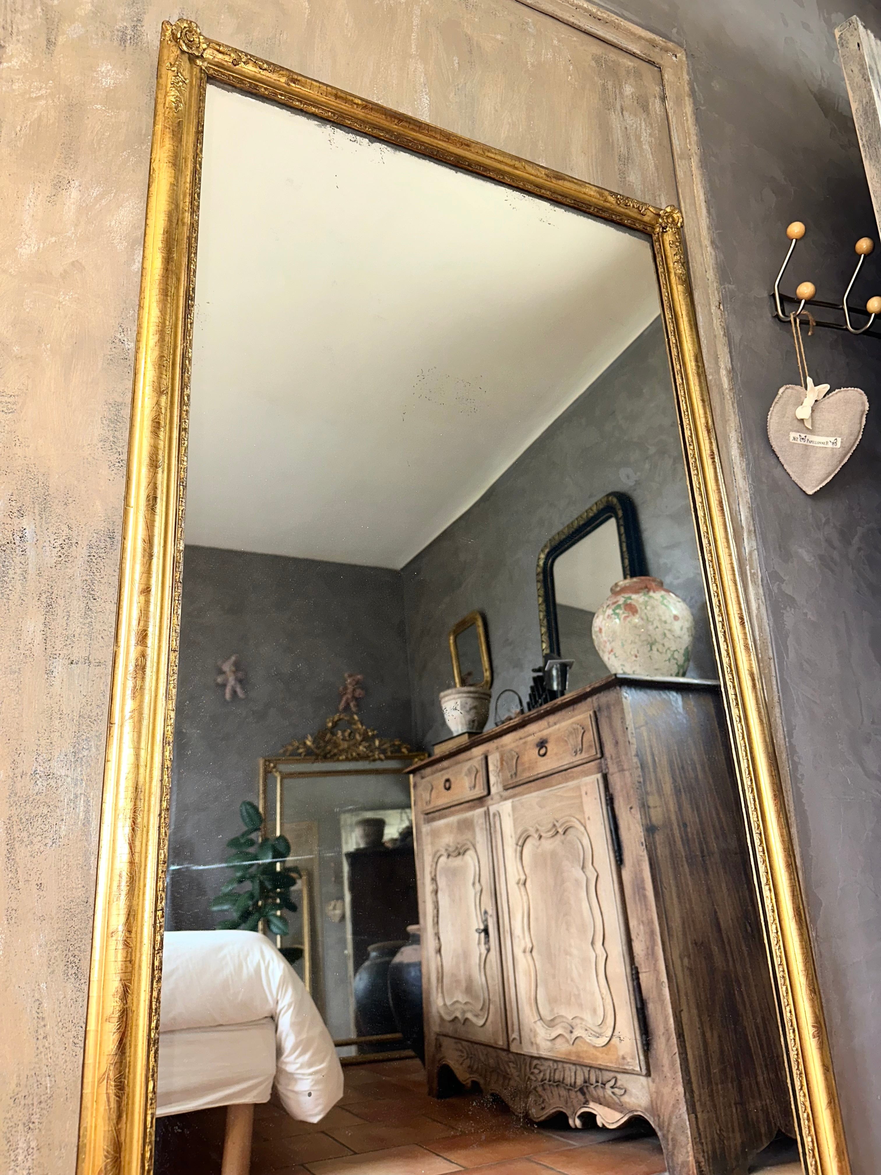 Miroir d’entre-deux ancien doré XIXème