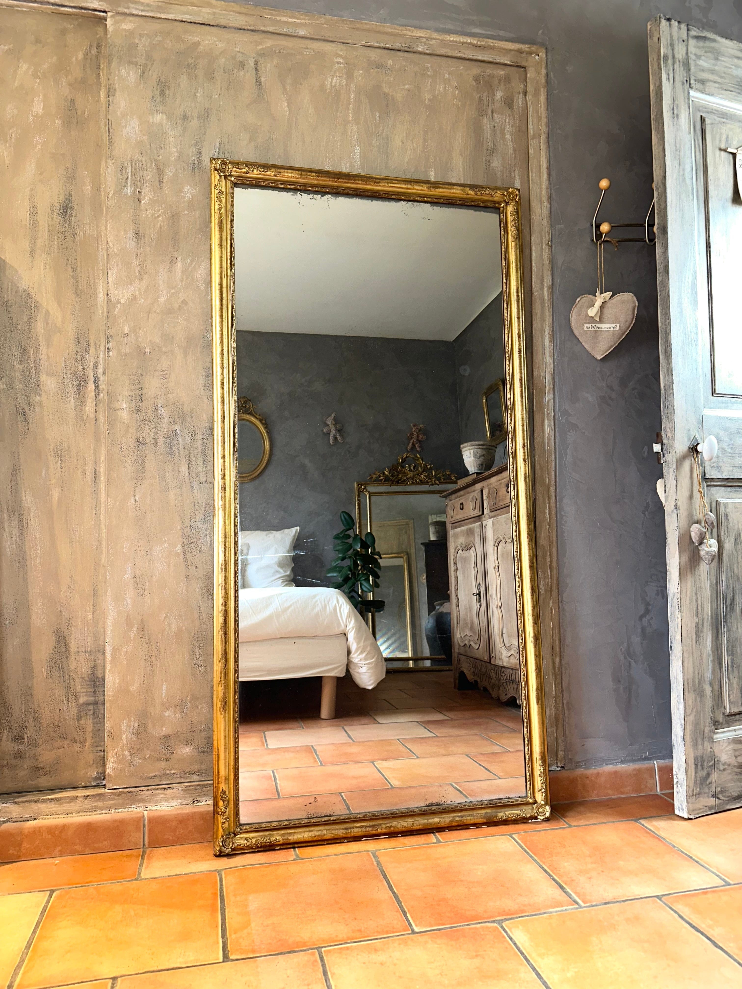 Miroir d’entre-deux ancien doré XIXème