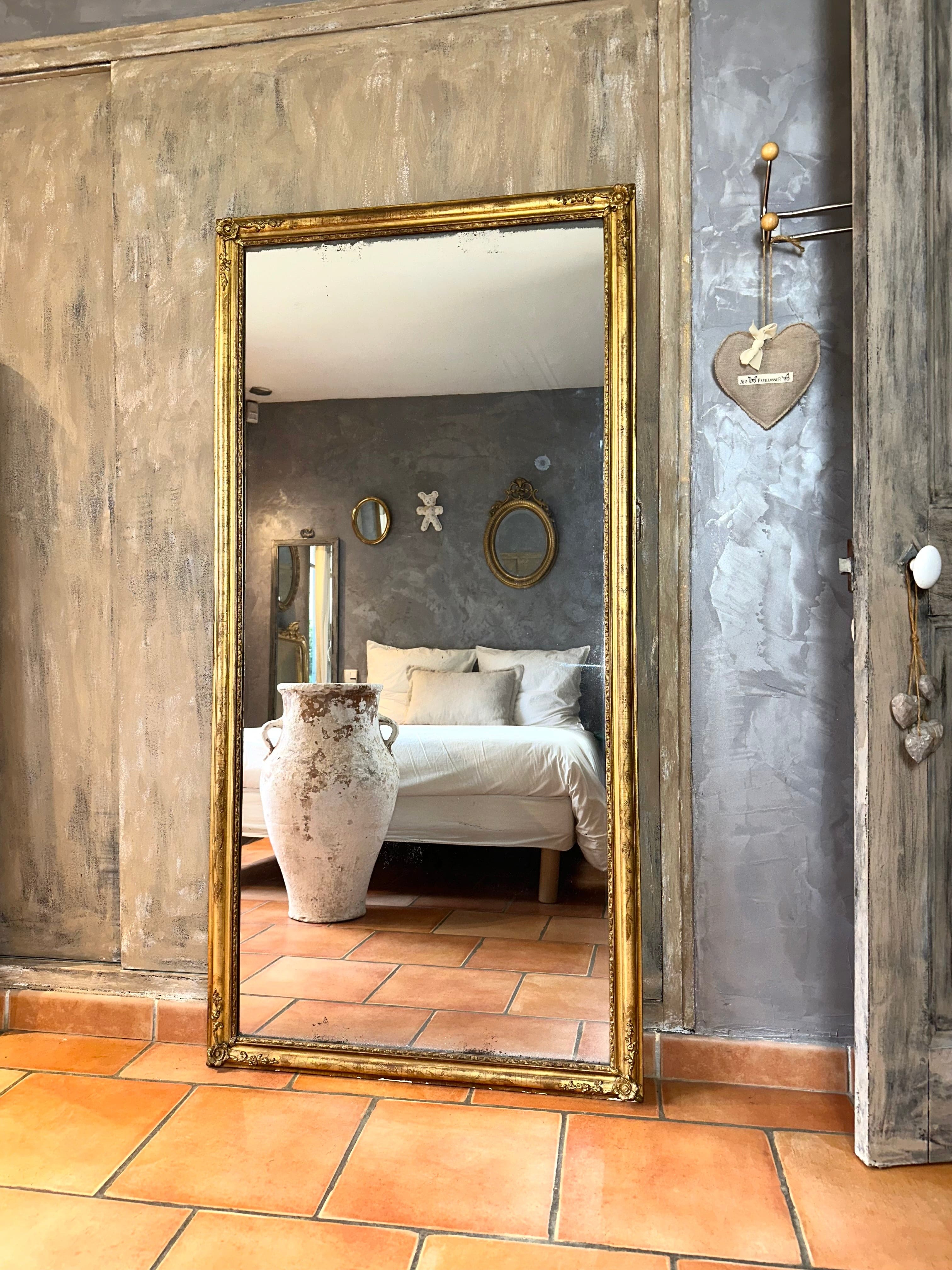 Miroir d’entre-deux ancien doré XIXème